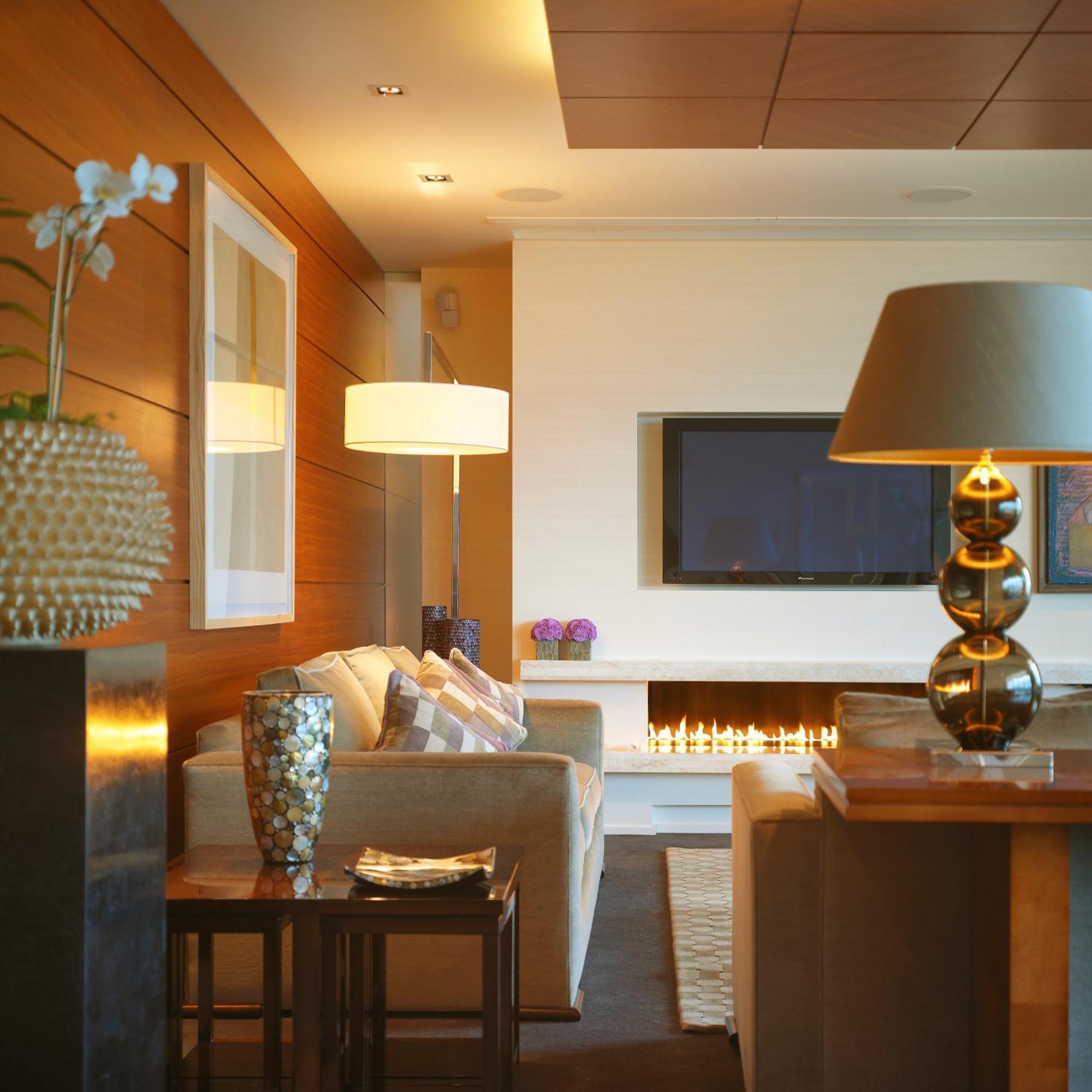 Aghadoe Heights Hotel & Spa Fossa Habitación foto A living room with a fireplace